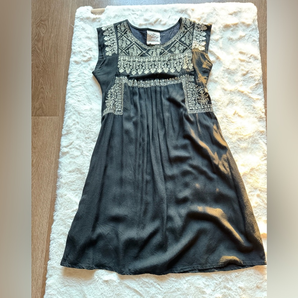 Elegant Black Dress with Intricate Patterns